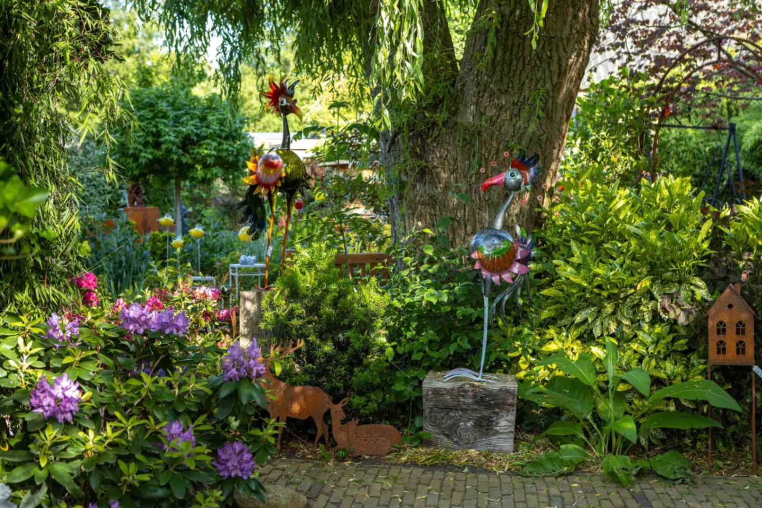 Kleurrijke tuinbeelden tussen het groen bij Diverse Pluimage